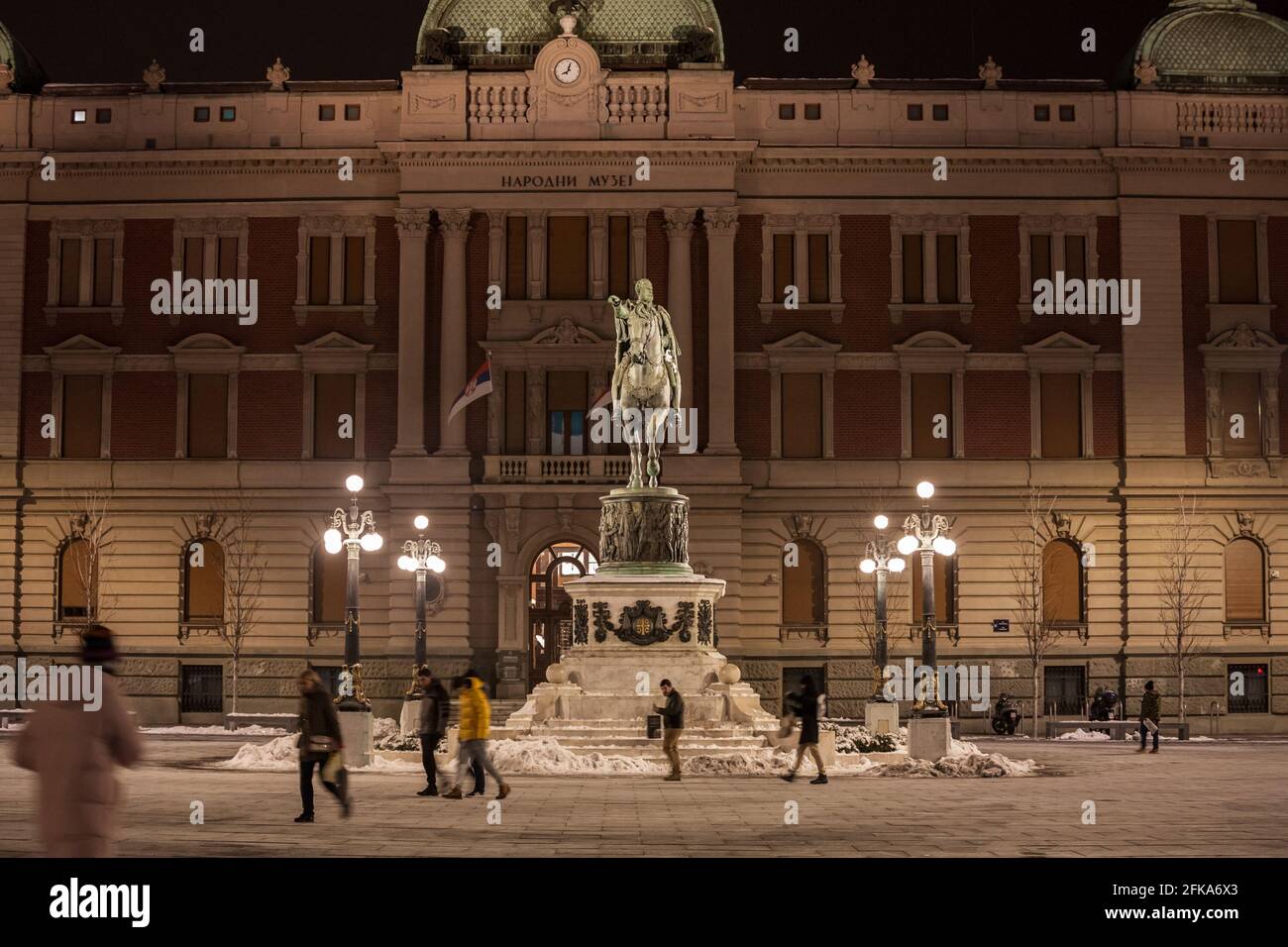 Picture of the national museum of Serbia in belgrade with the statue of Prince Mihailo in front, on Trg Republike, also called republic square at nogh Stock Photo