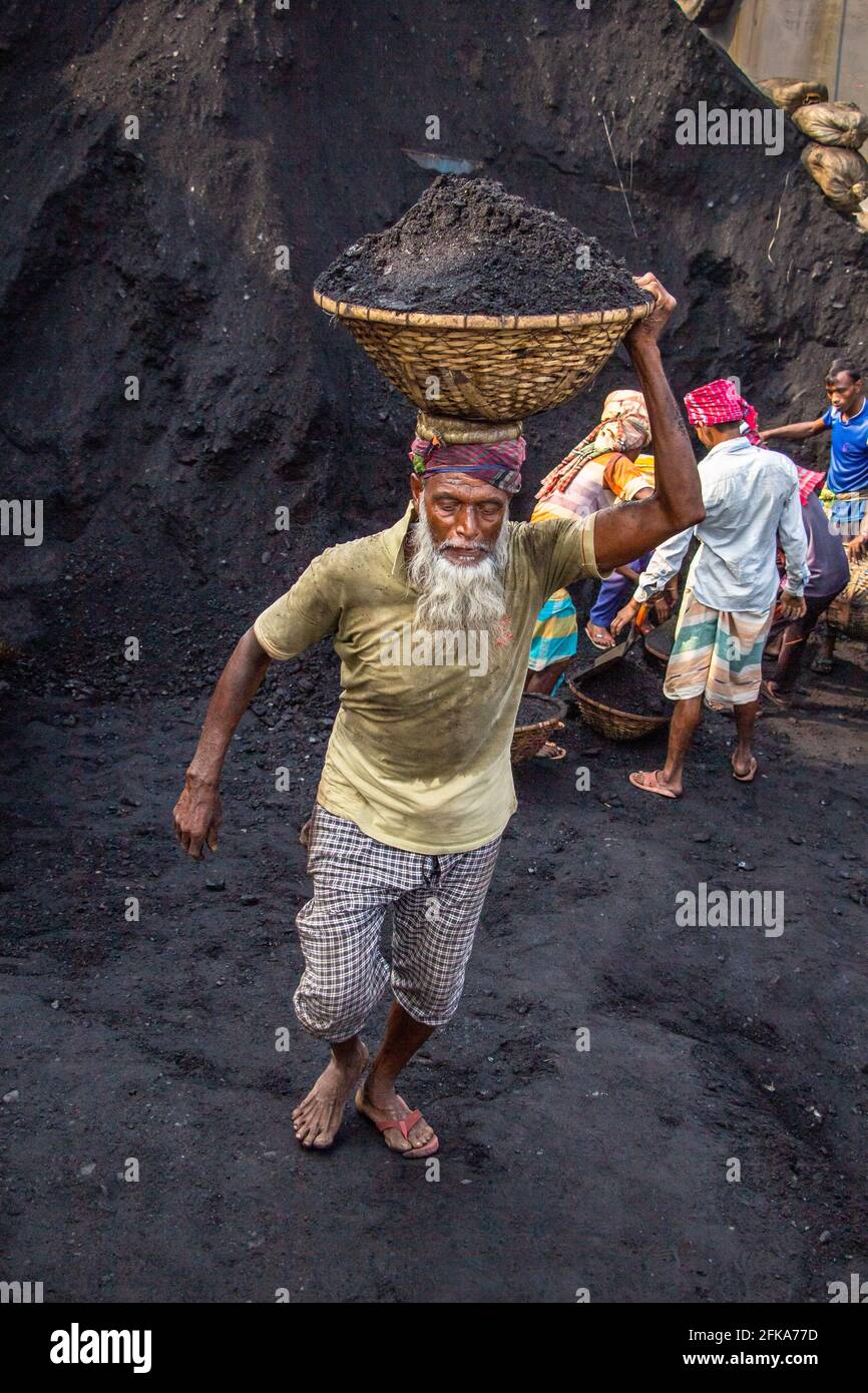 People working hard for changing hard lifestyles, I captured this image on 17-11-2018 from Amen Bazar, Dhaka, Bangladesh, Asia Stock Photo