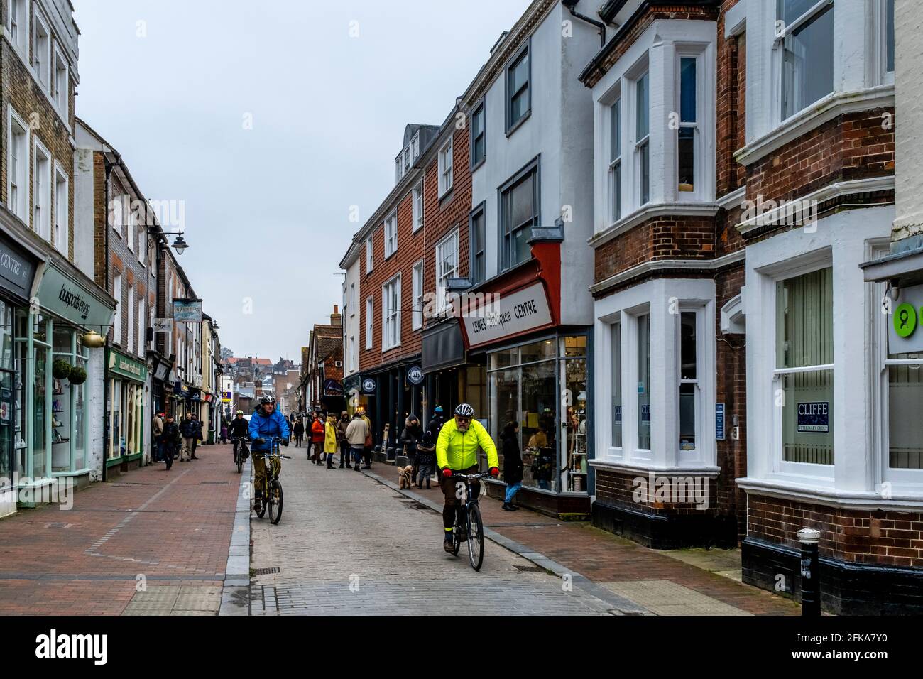 Cyclists in high street hi-res stock photography and images - Alamy