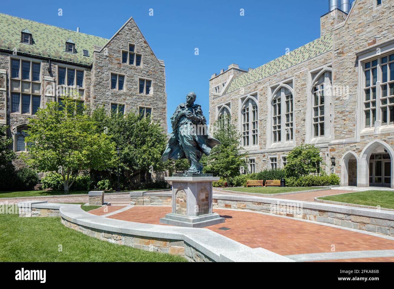 Boston College, Saint Ignatius Loyola statue, Devlin and Higgins Halls, Chestnut Hill, Newton MA Stock Photo