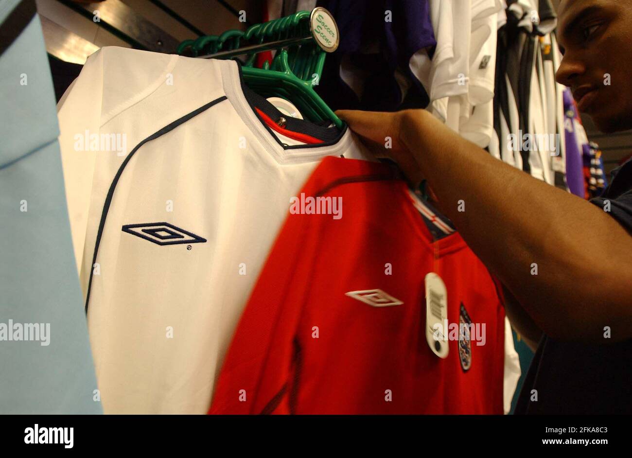 Umbro shirts on sale in Carnaby Street. Umbro has recently been accused of  price fixing.16 May 2002 photo Andy Paradise Stock Photo - Alamy
