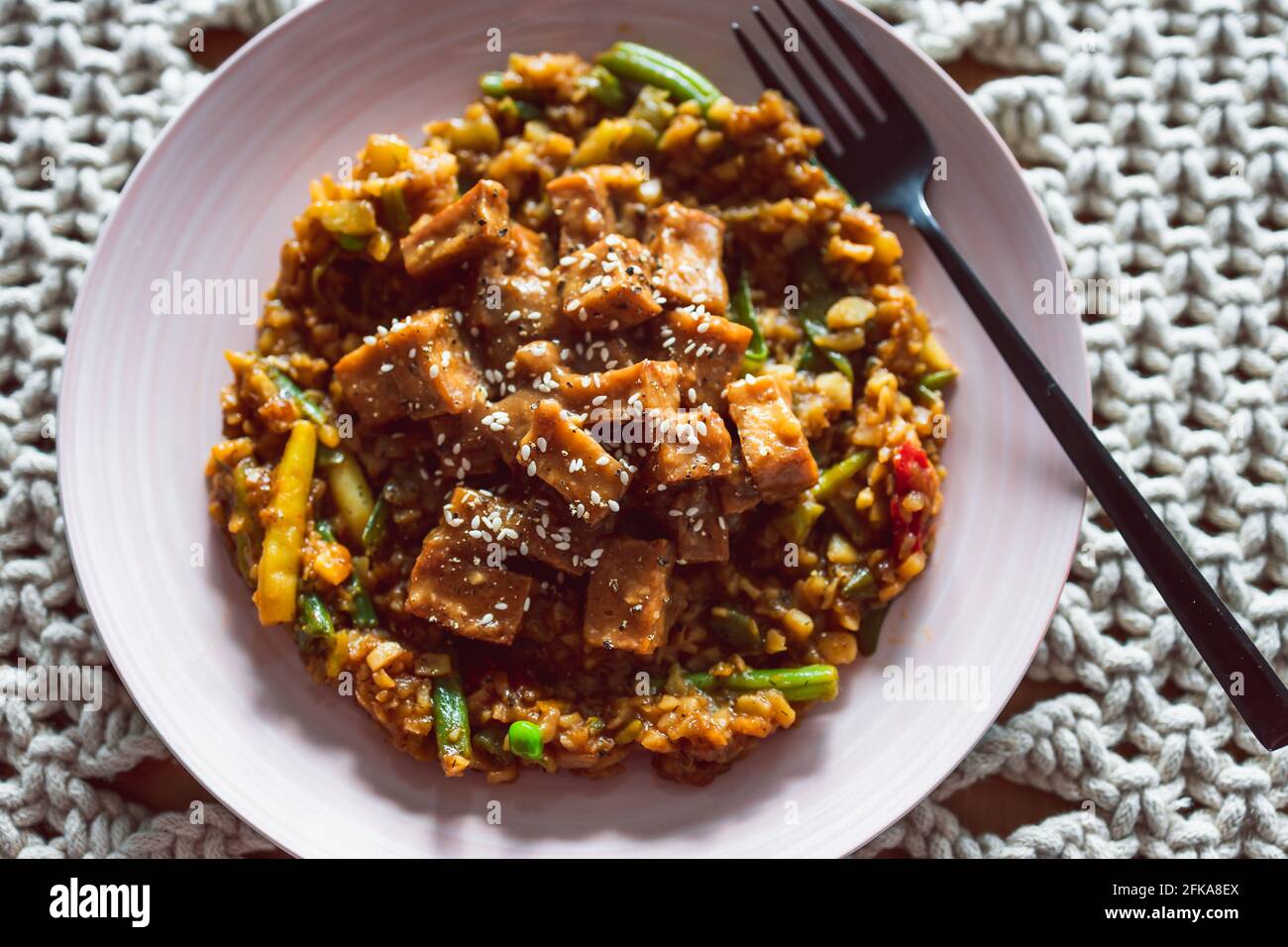 vegan Korean teriyaki sticky tofu with stir fry vegetables, healthy