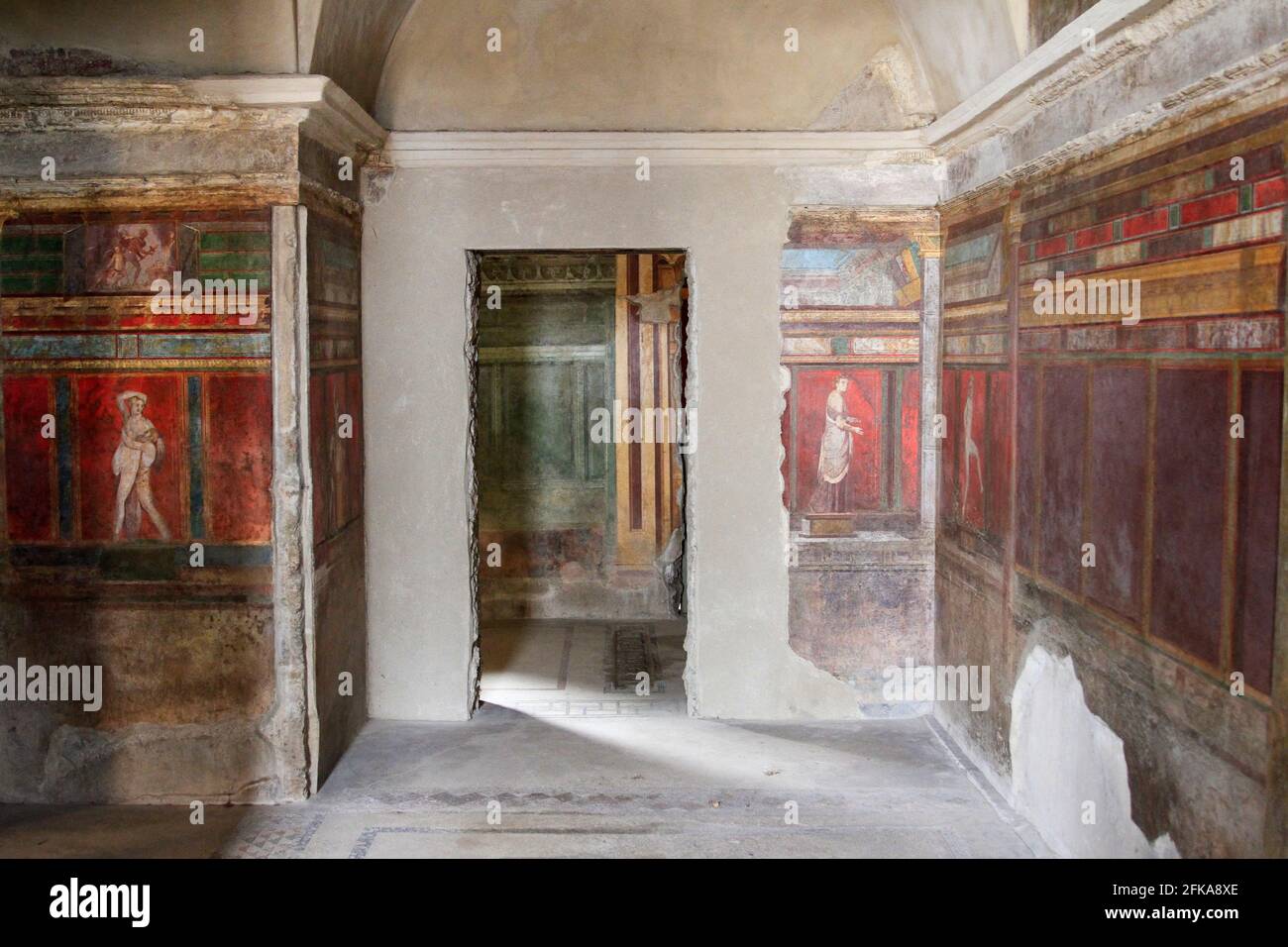 Colorful painted frescoes in the Villa of the Mysteries, Pompeii, Italy Stock Photo