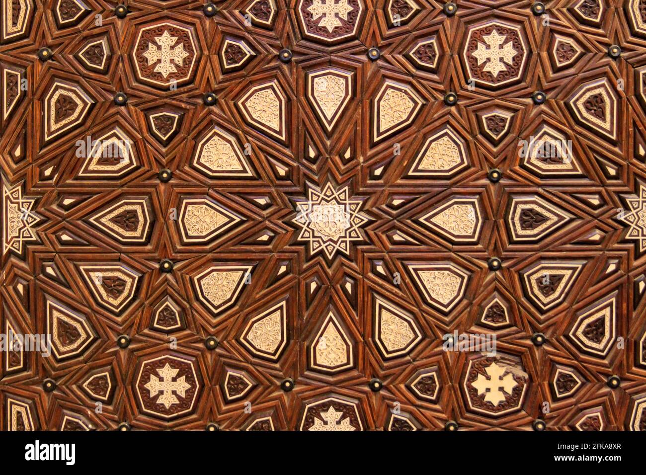 Close up of intricately carved inlaid wood wall, Cairo, Egypt Stock Photo