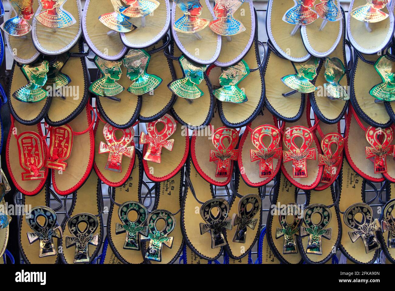 Rows of colorful slip on shoes with ankh at market in Cairo, Egypt Stock Photo