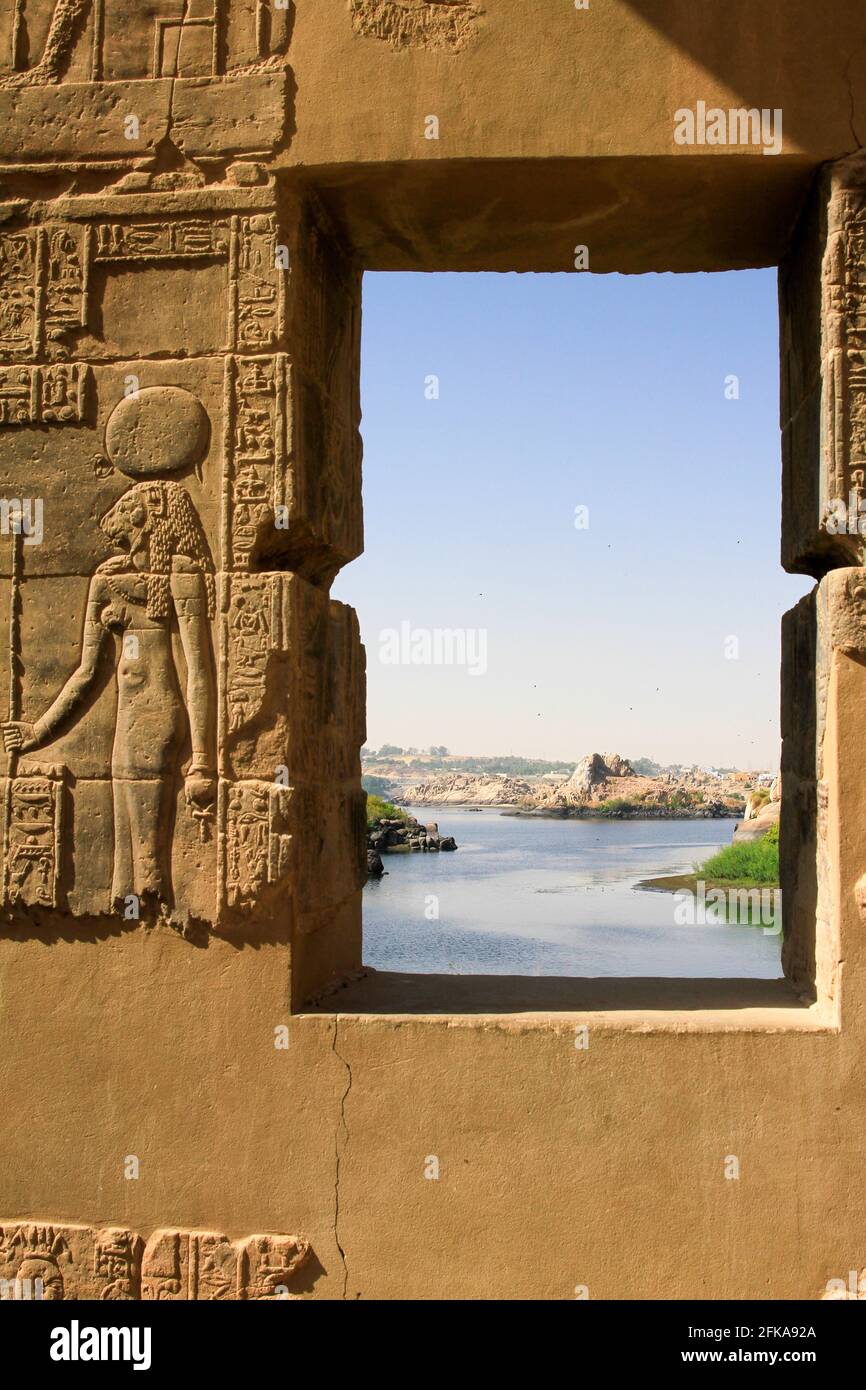 View of water and sky through window framed by hieroglyphics at Philae Temple, Philae, Egypt Stock Photo