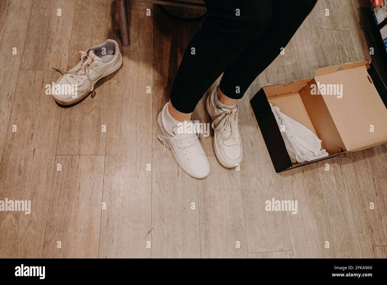 woman buying new shoes in the store Stock Photo