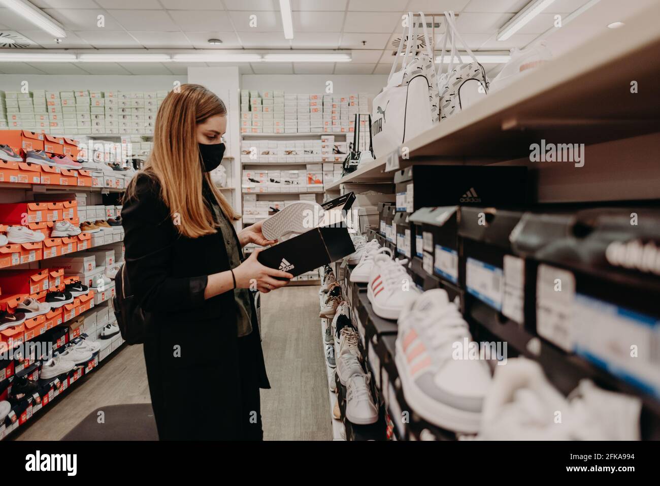 Sarajevo, Bosnia and Herzegovina - 26.04.2021: woman shopping in store after reopening , after covid 19 lockdown Stock Photo