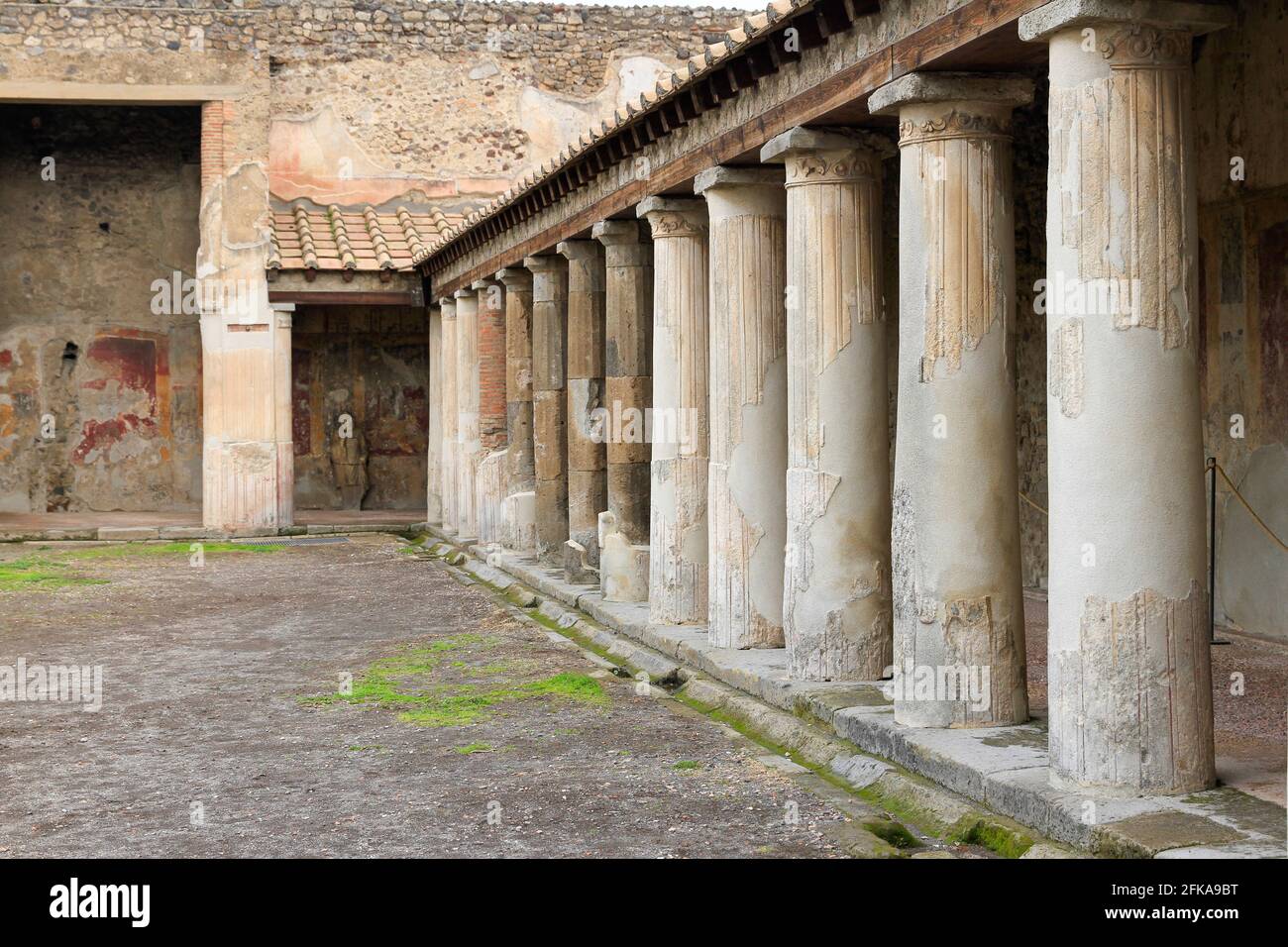 Columns in courtyard in Roman villa in Pompeii, Italy Stock Photo