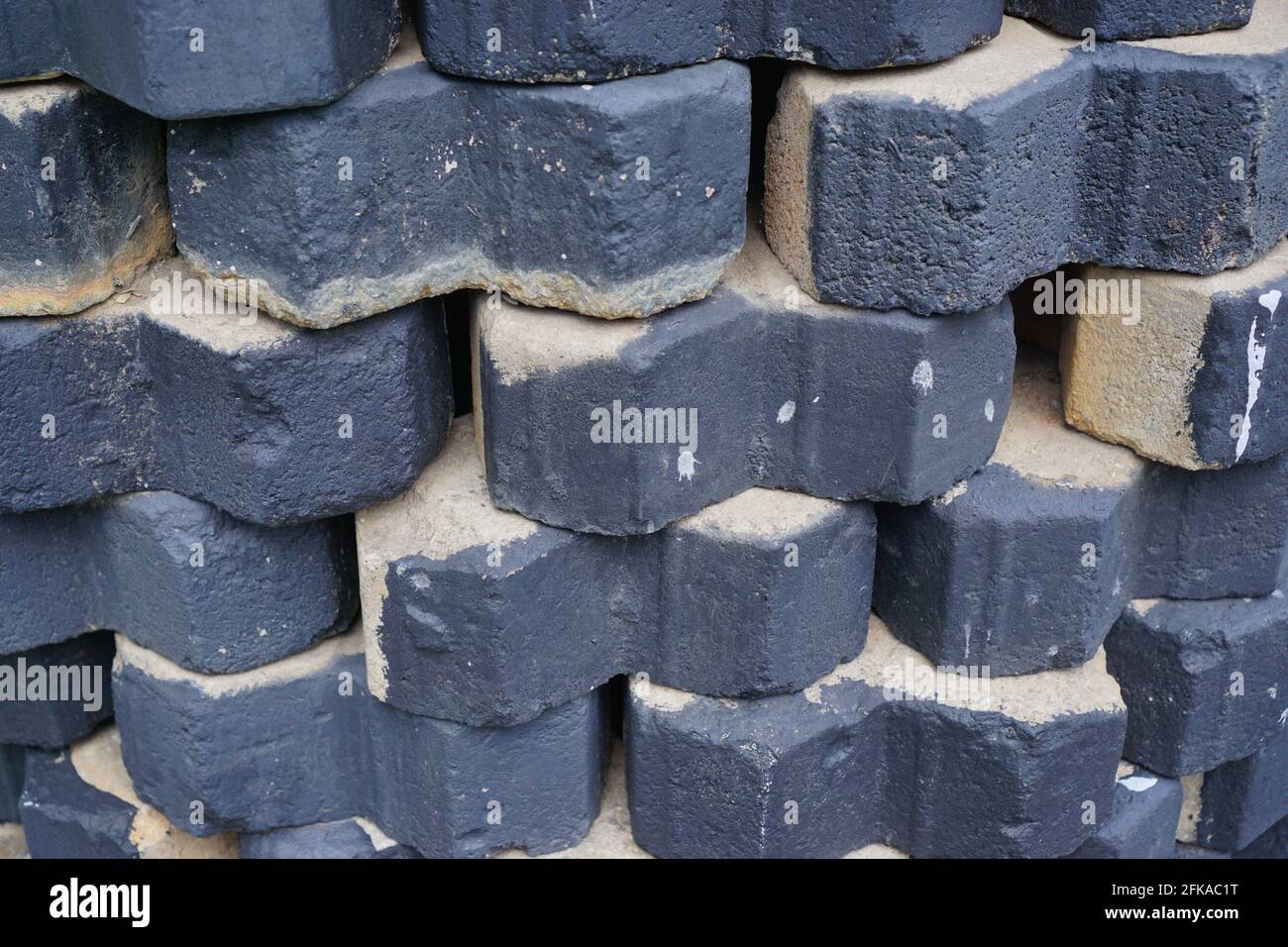 A stack of bricks in gray. Stock Photo