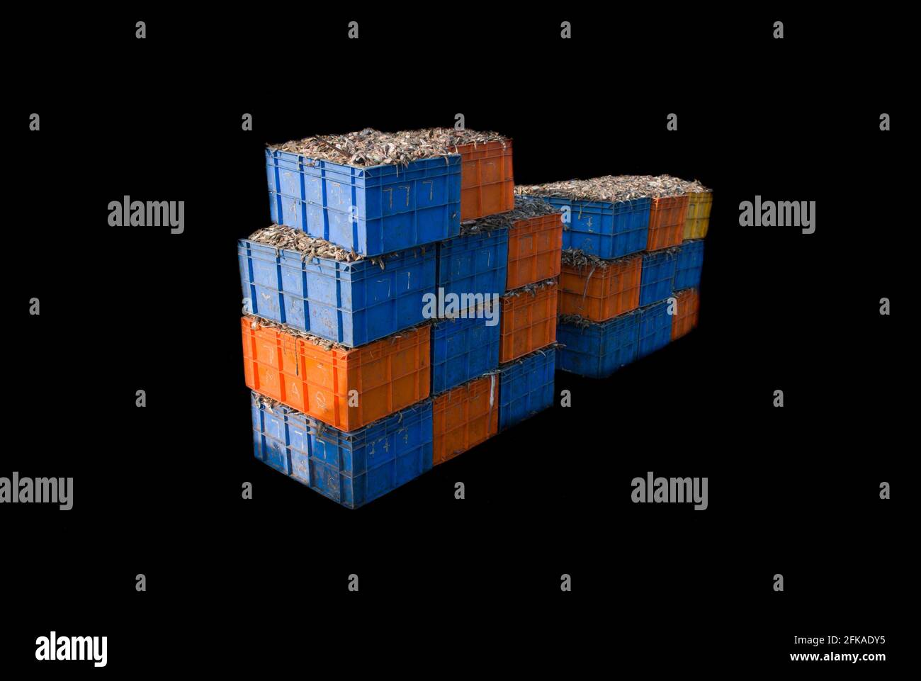Indian fish export containers tower isolated on black. Stock Photo