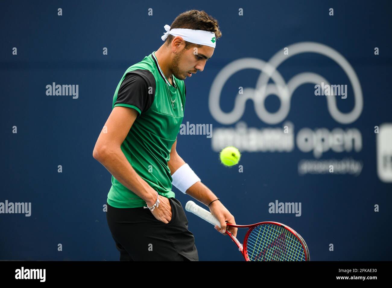 March 24, 2021 Alejandro Tabilo of Chile between points during his loss to Mikael Ymer of Sweden in the first round of the Miami Open on March 24, 2021 on the grounds
