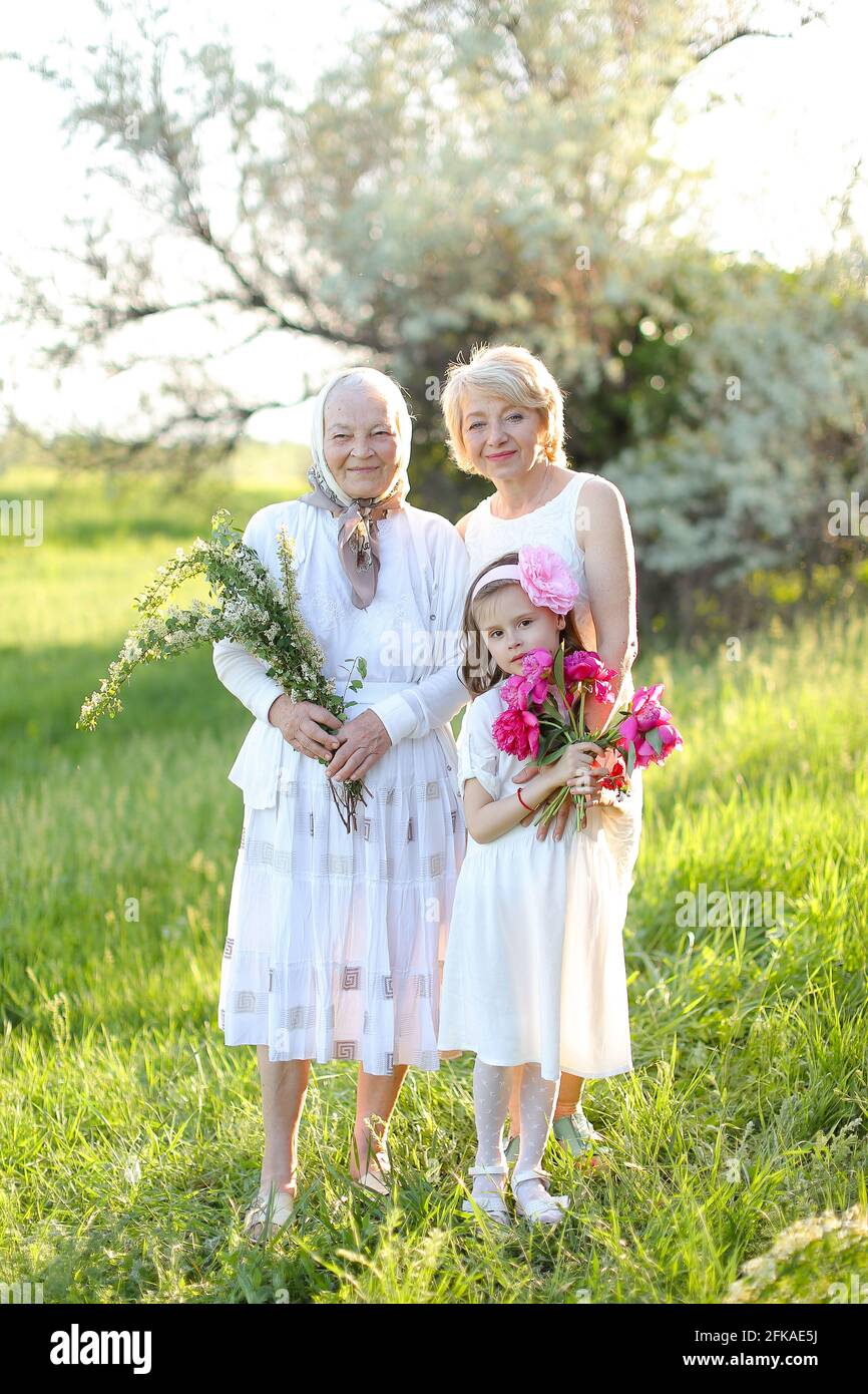 Caucasian granny in white dress with daughter and granddaughter outside Stock Photo - Alamy Caucasian granny in white dress with daughter and granddaughter outside Stock Photo - Alamy
