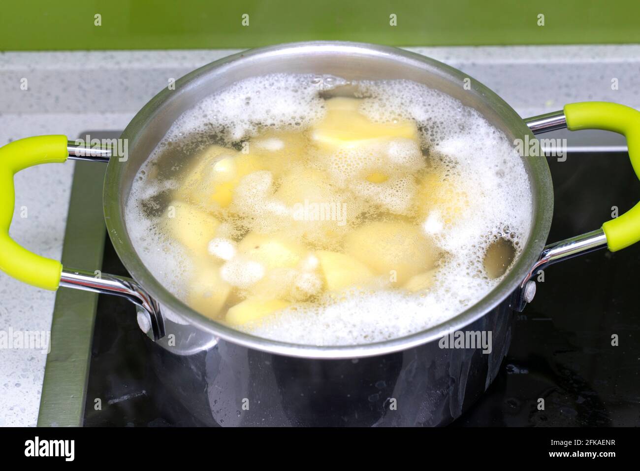 cooking process in a saucepan on an induction hob Stock Photo Alamy