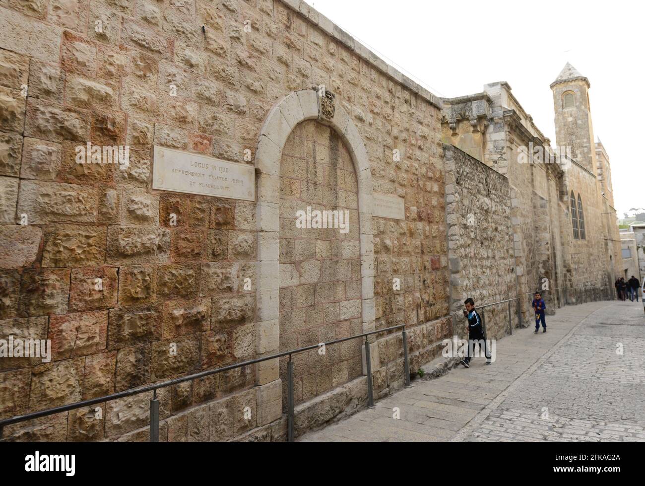 Old monasteries on Lions gate street in the old city of Jerusalem. Stock Photo