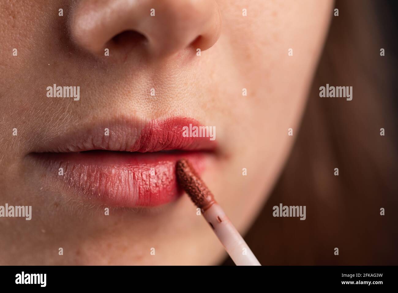 woman using a red lipstick Stock Photo