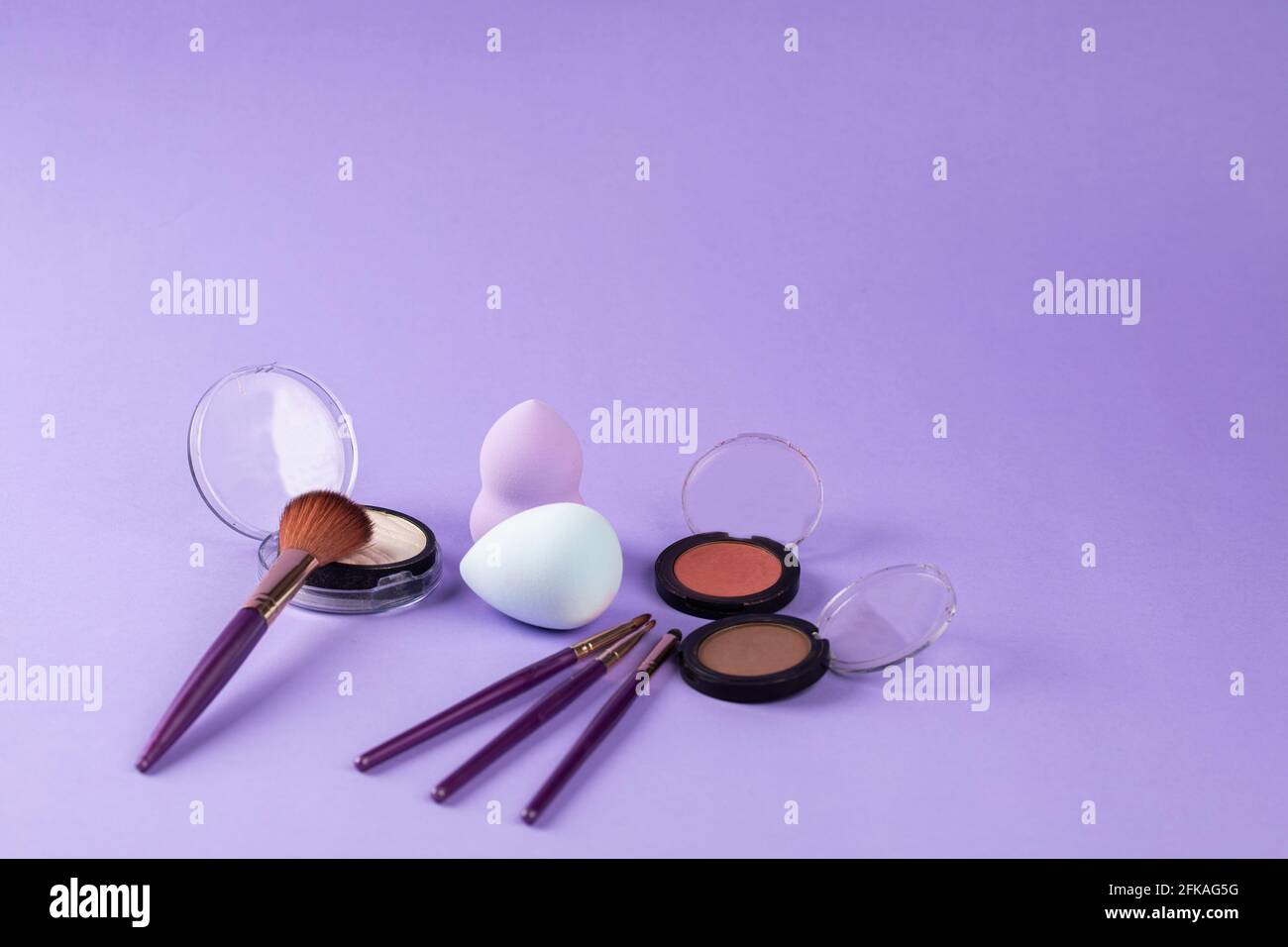 blushes, beauty blender and make up brushes Stock Photo
