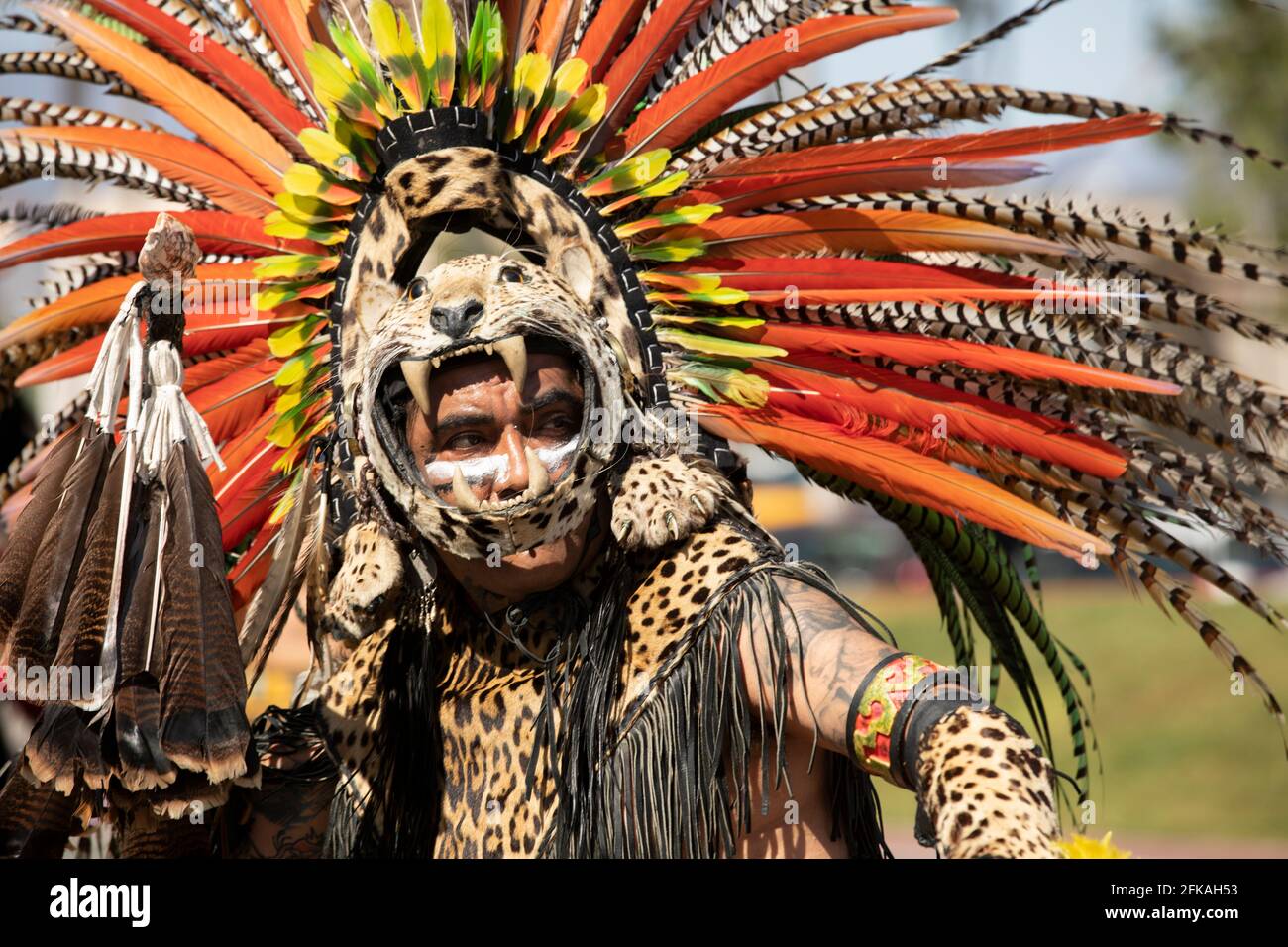 Baldwin Park, California, USA - April 18, 2021: Indigenous dancers perform in full regalia. Stock Photo