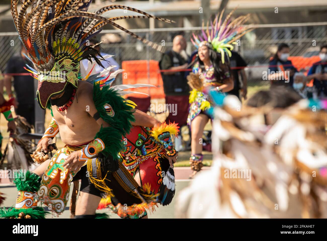 Baldwin Park, California, USA - April 18, 2021: Indigenous dancers perform in full regalia. Stock Photo