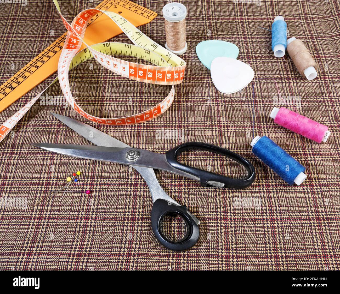 Thread measuring tape scissors on hi-res stock photography and