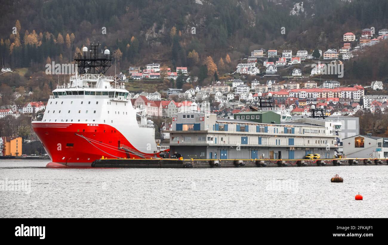 Norwegian offshore Supply Ship is moored in Bergen port, Norway Stock Photo