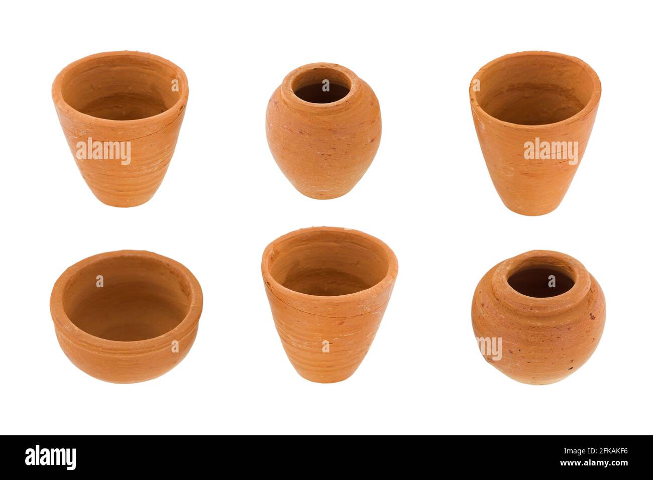 Handmade small round unglazed clay pots in different size, type, shape