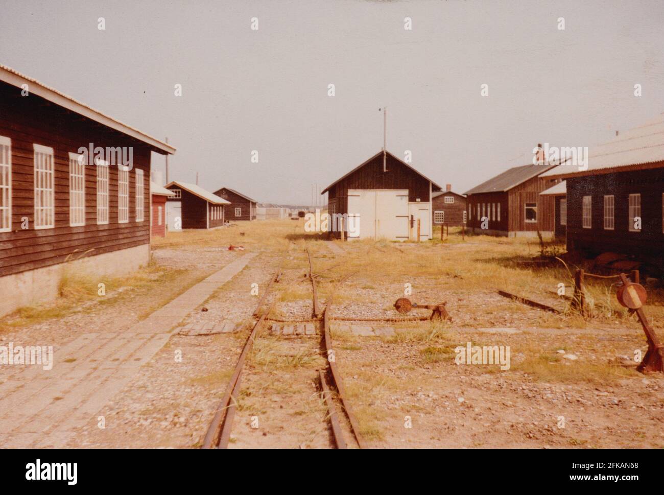 Agger, Denmark - 1983: The workshops of the coasst maintenance 'Vandbygningsv�senet' with the now removed narrow gauge railway tracks (785mm) Stock Photo