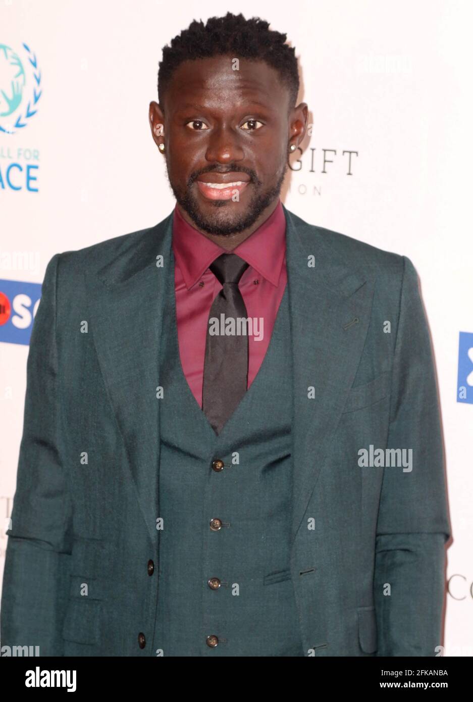 Apr 08, 2019 - London, England, UK - Football For Peace Initiative Dinner by Global Gift     Photo Shows: Adrissa Gana Gueye Stock Photo