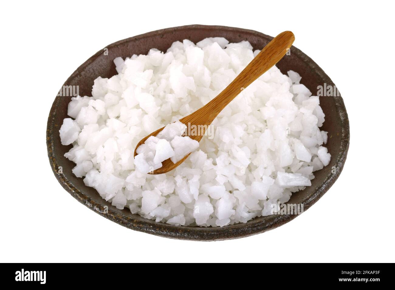 A bowl of clean natural Sea Salt isolated on white background Stock