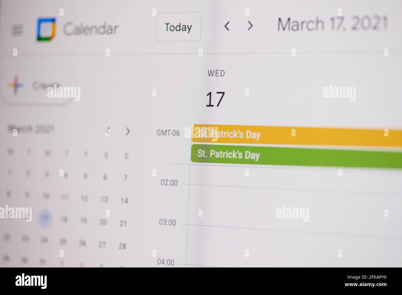 New york, USA - February 17, 2021: St Patrick 17 of march on google calendar on laptop screen close up view. Stock Photo