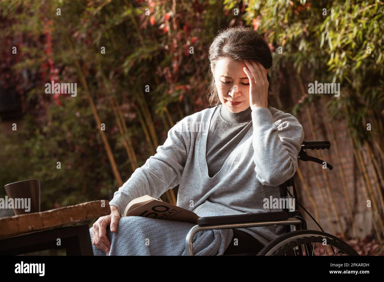 Indian old woman wheelchair hi-res stock photography and images - Alamy