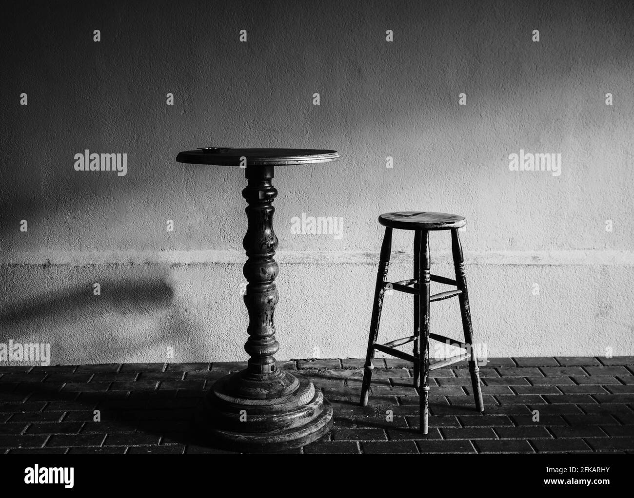 antique table and chair in the cafe. black and white photography Stock Photo