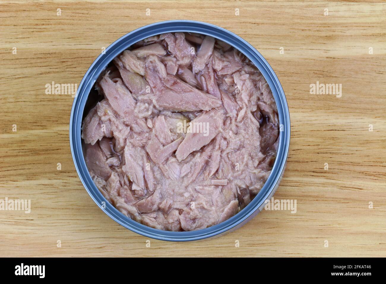 A can of Tuna Fish flakes in Brine Salty Water Stock Photo Alamy