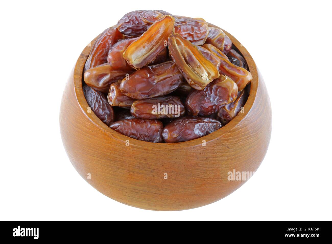 A wooden bowl full of natural dried Deglet Nour dates from Israel Stock Photo