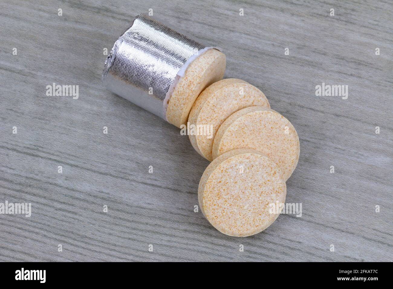 Vitamin C and Zinc - Orange flavored effervescent tablets to be dissolved in water Stock Photo