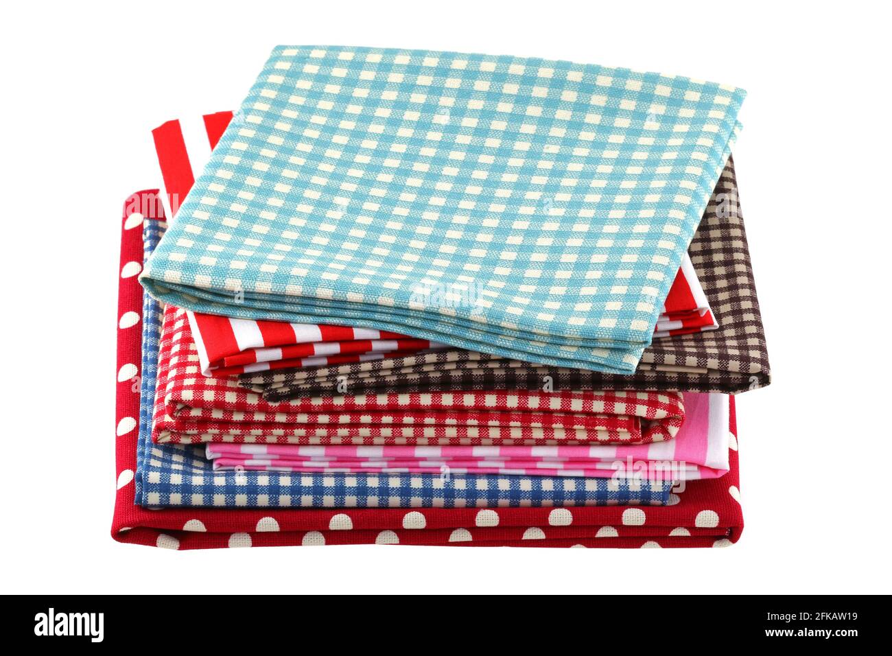 Folded fabric with different patterns, isolated on white Stock Photo ...