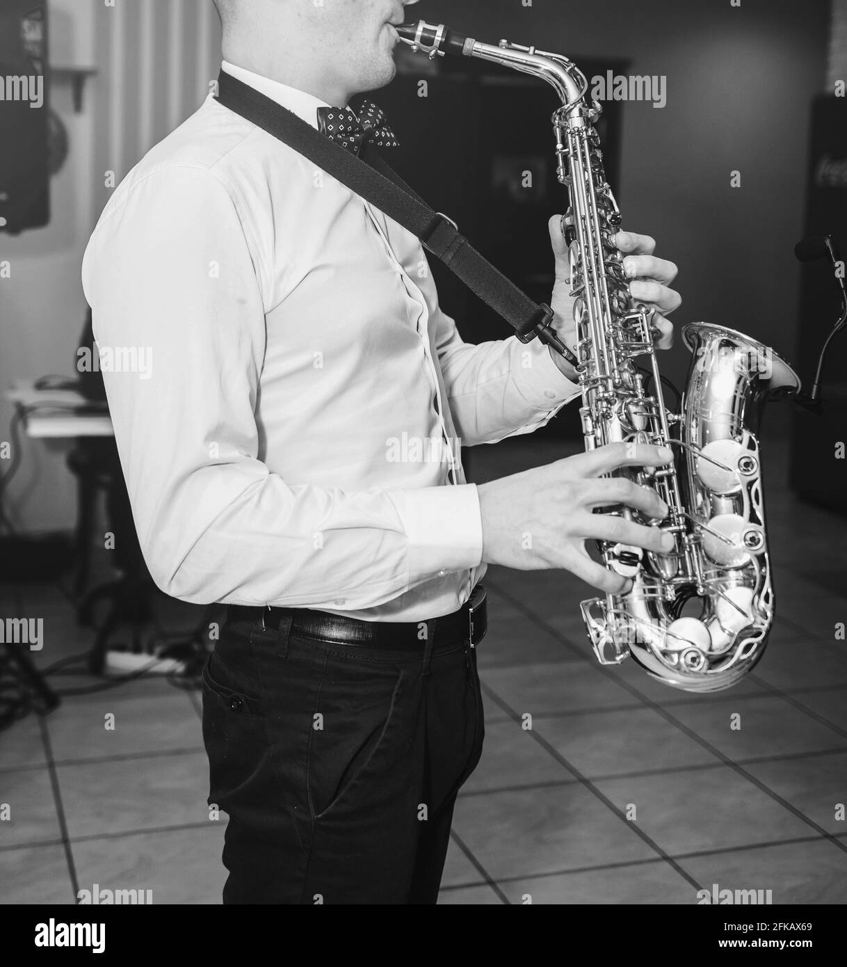 Saxophone player hands saxophonist playing jazz music Stock Photo Alamy