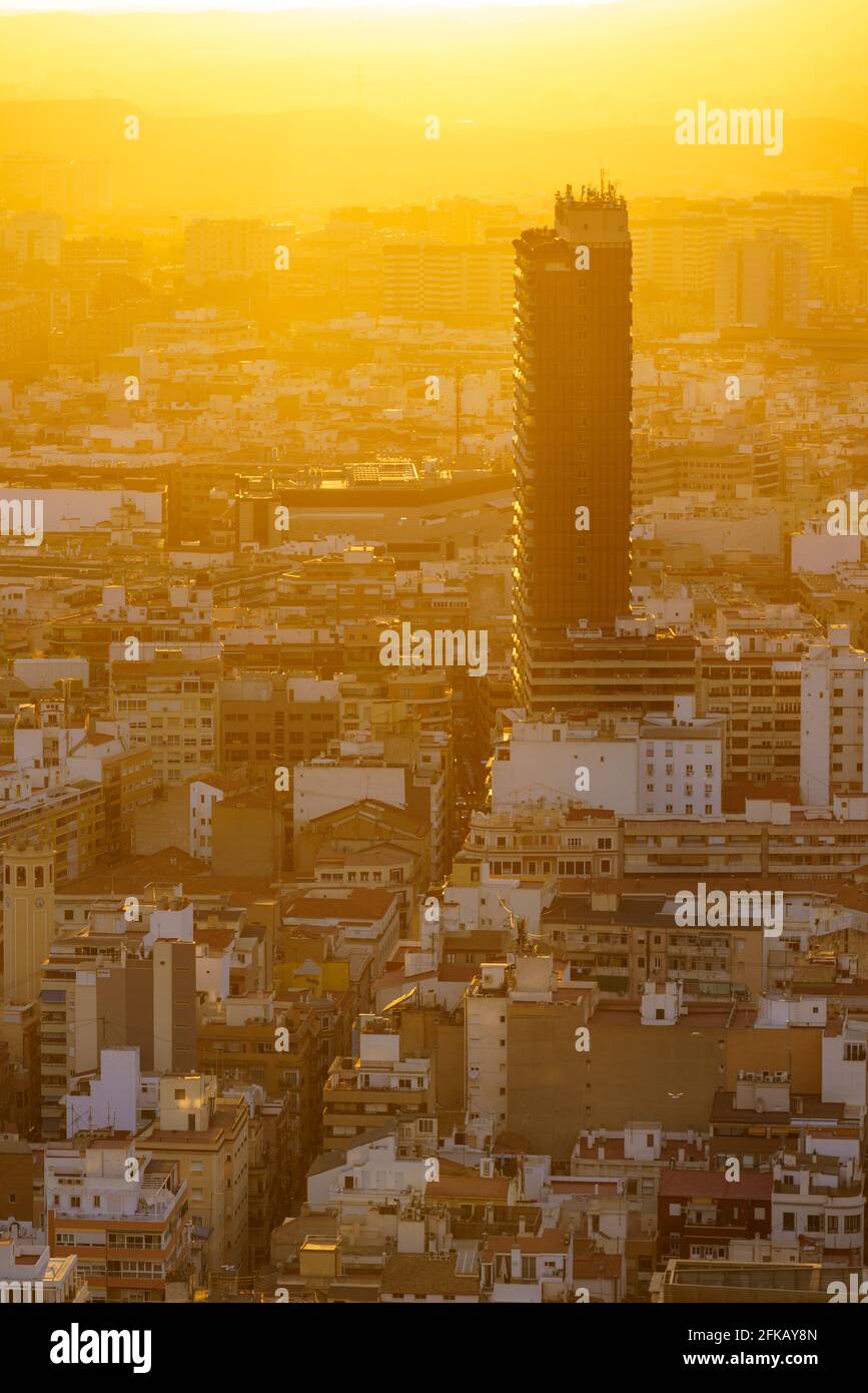 View of Alicante city by the end of the day. Urban landscape in orange. warm tones. Skyscraper Isolated Stock Photo