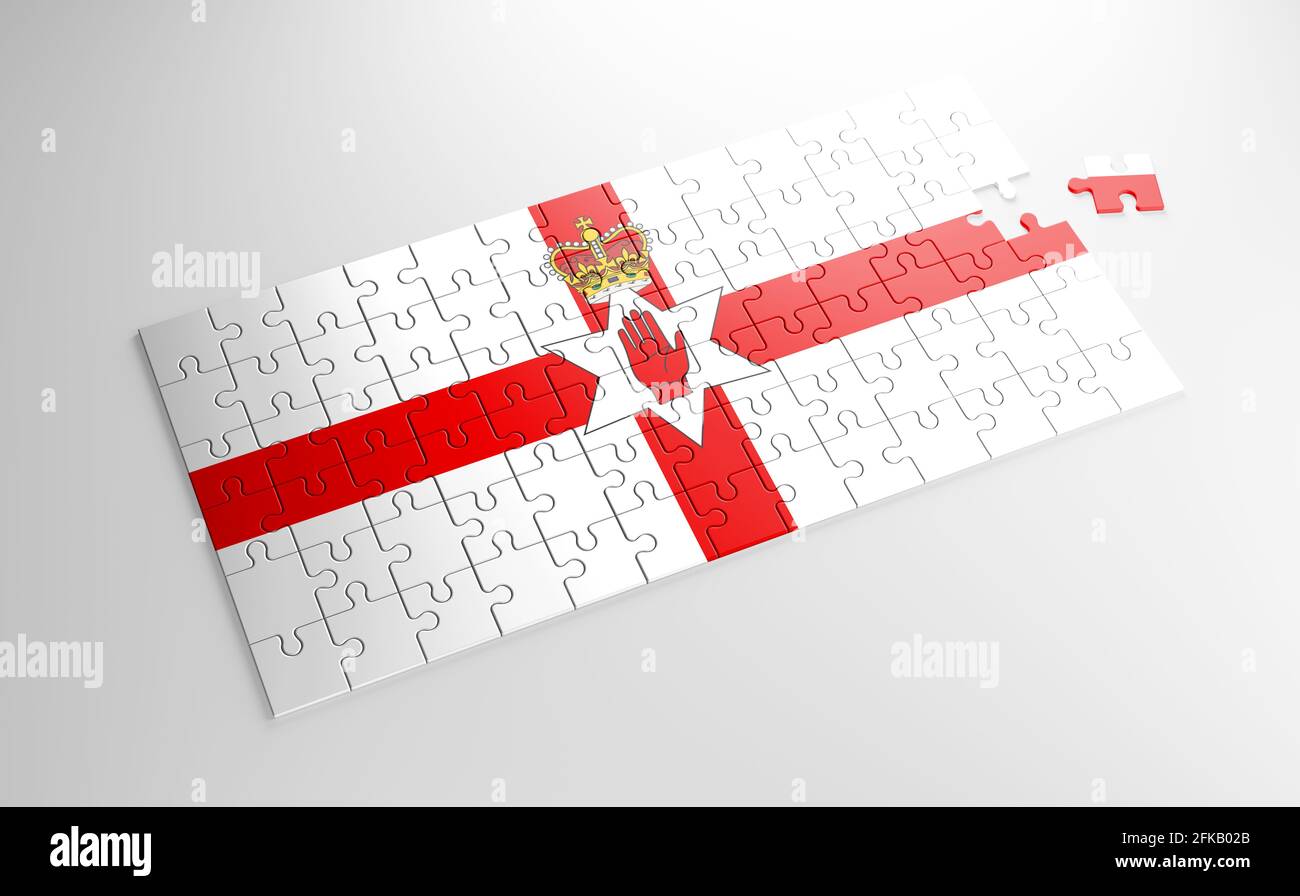 A jigsaw puzzle with a print of the flag of Northern Ireland, pieces of