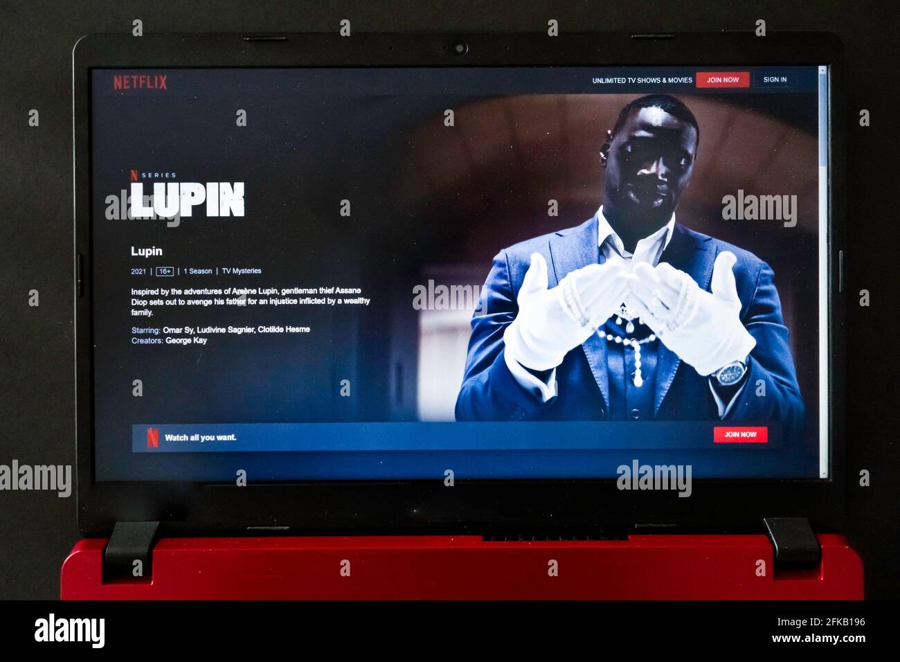 laptop screen with Netflix tv series Lupin Stock Photo