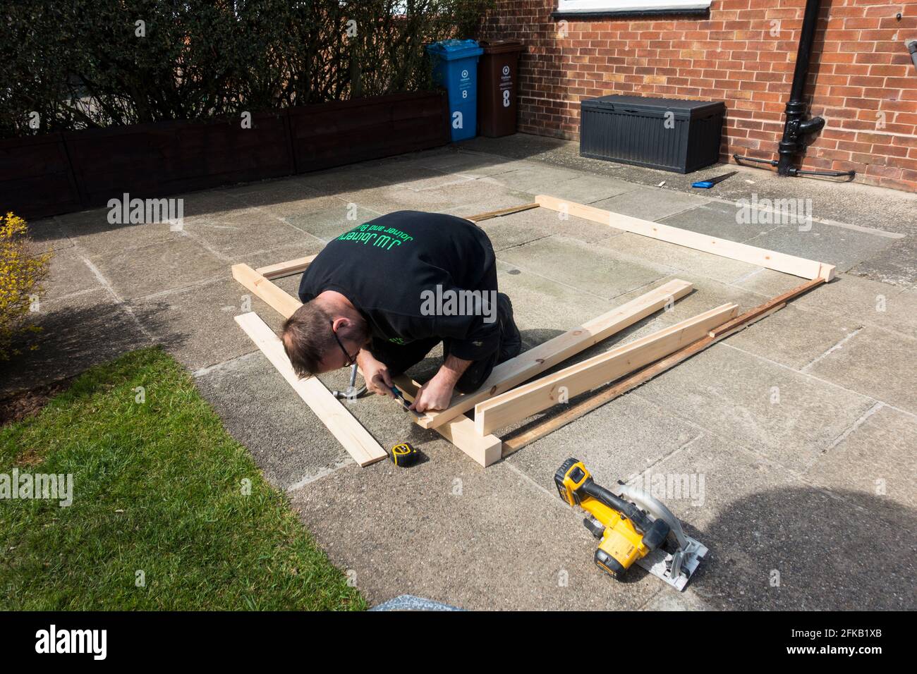 Joiner making up a soft wood frame, England, UK Stock Photo Alamy