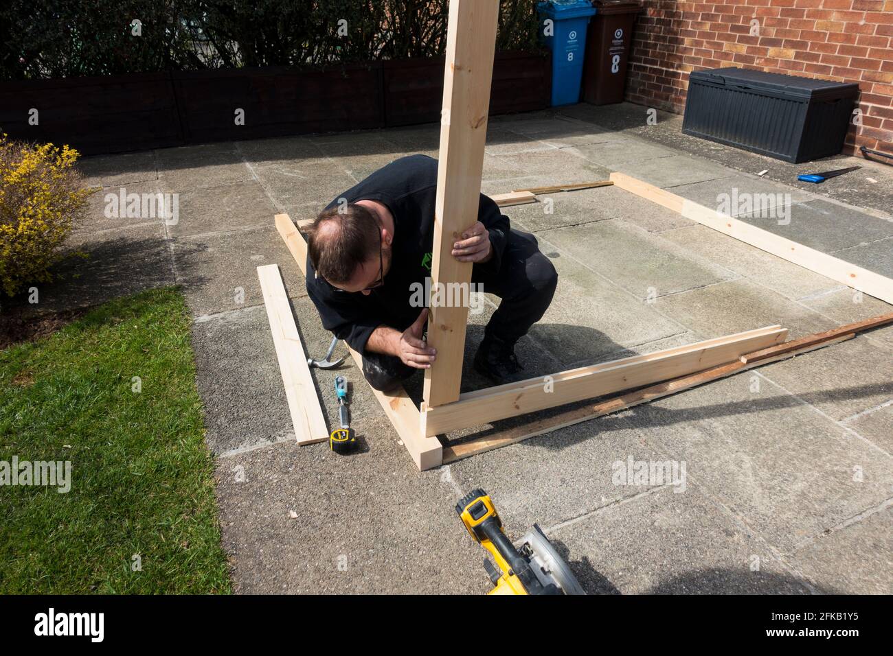 Joiner making up a soft wood frame, England, UK. Stock Photo