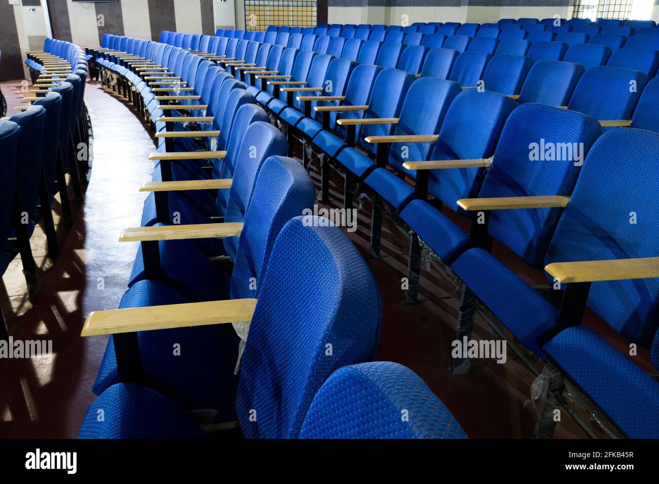 a long shot of chairs pattern in function hall , Kalaburagi, Karnataka, India-April 17.2021 Stock Photo