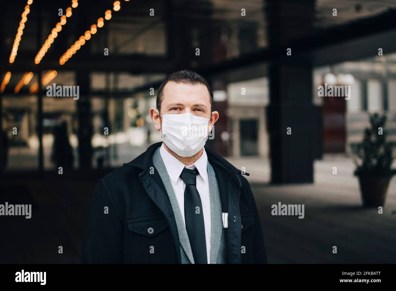 Portrait of businessman with protective face mask Stock Photo