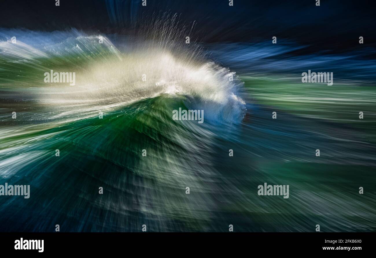 Crest of a wave as it splashes and crashes in Victoria Bay, Western Cape Stock Photo
