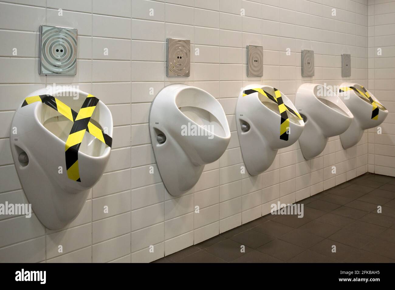 urinal, Corona spacing rules in a men's toilet, Germany Stock Photo Alamy