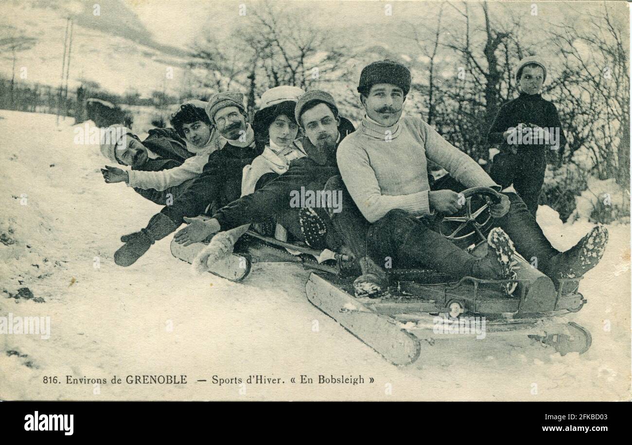 Grenoble. Sportsmen on a bobsleigh Country: France. Department: 38 - Isère. Region: Auvergne-Rhône-Alpes (formerly Rhônes-Alpes). Old Postcard, Late 19th - Early 20th century. Stock Photo