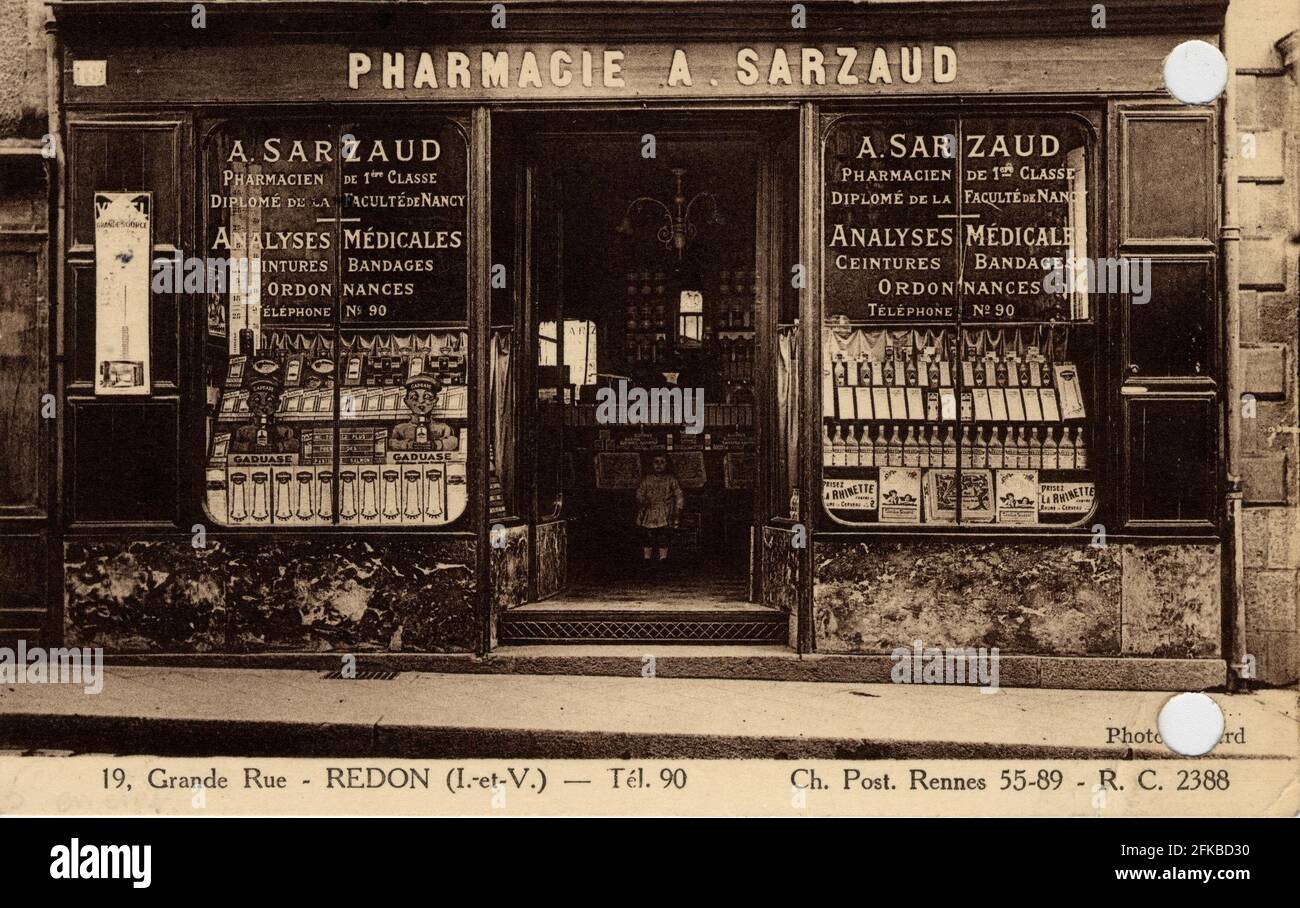 French pharmacy in a street of Redon Ille et Villaine Brittany beginning of 20th century Vintage postcard Stock Photo