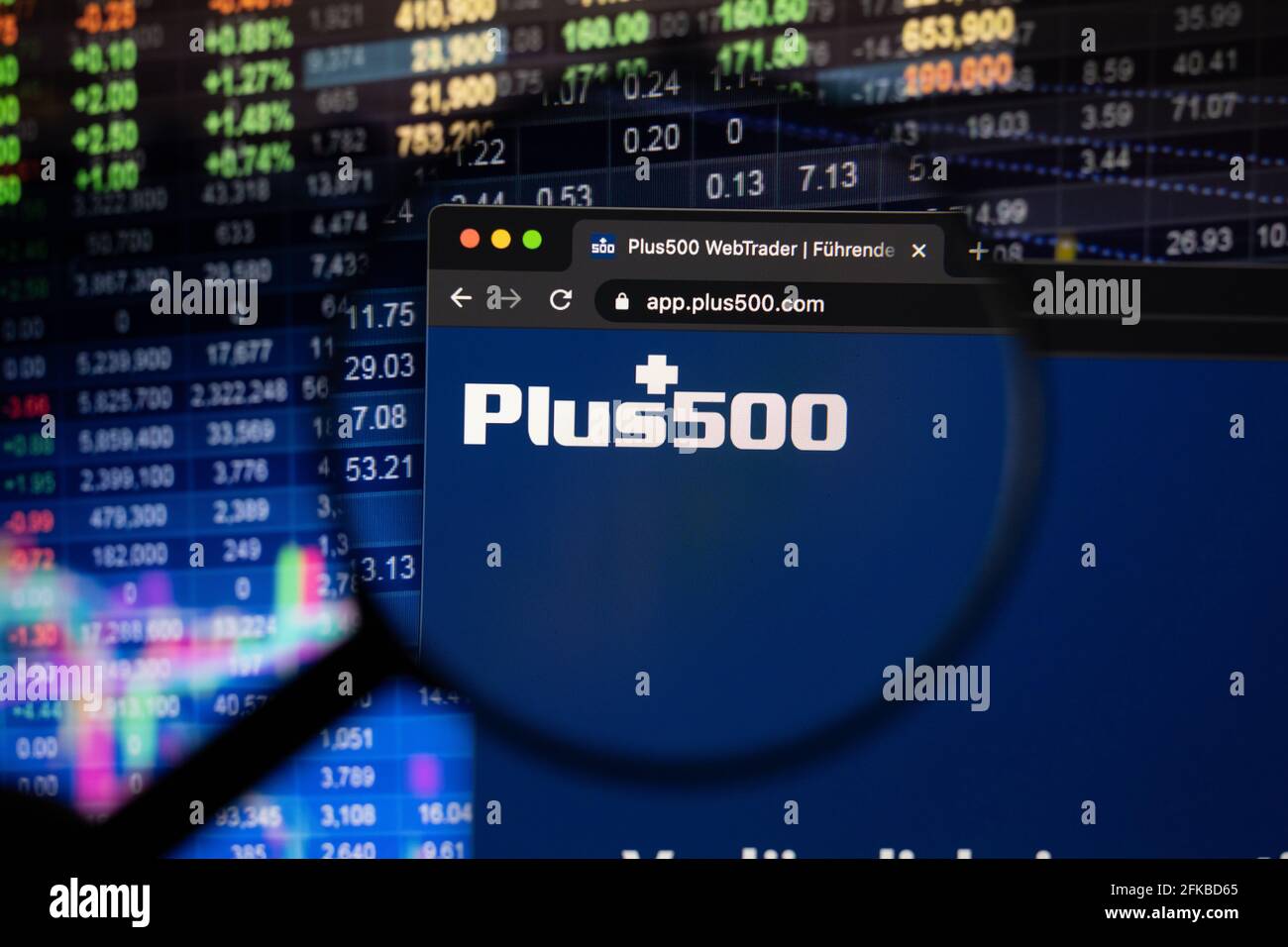 Plus500 company logo on a website with blurry stock market developments in  the background, seen on a computer screen through a magnifying glass Stock  Photo - Alamy
