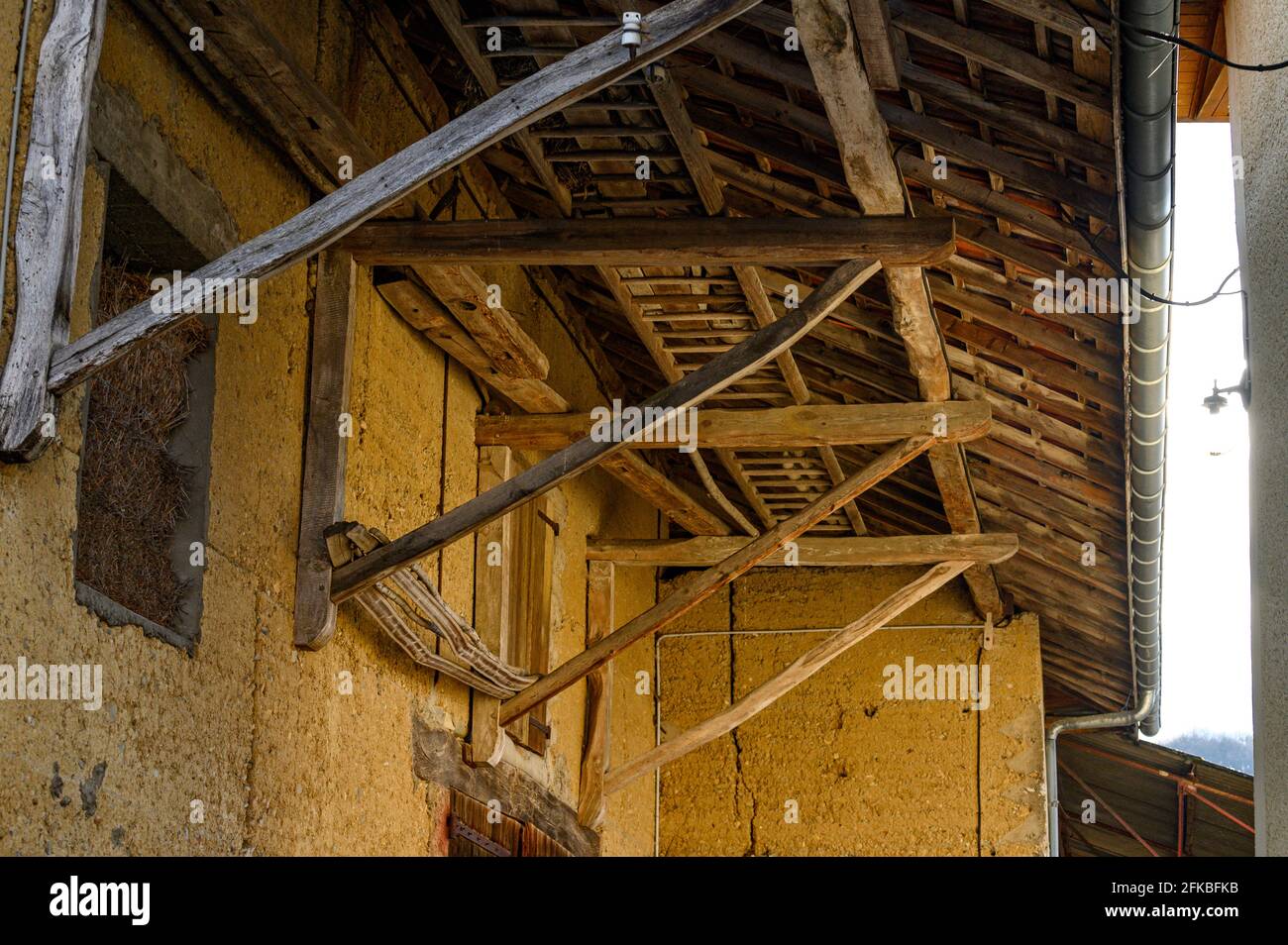 Wooden support structure used for supporting the weight of roof. Stock Photo